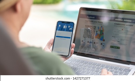 PETCHABURI, THAILAND-MAY 13, 2019: Facebook Social Media App Icon Signup Page On Iphone XR Mobile Smartphone Device And Computer Laptop For User FB Live Public Communication Network.