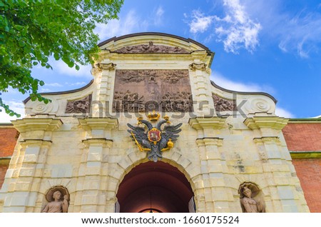 Peter Gate with double-headed Imperial Eagle of State Museum of Leningrad History building in Peter and Paul Fortress citadel on Zayachy Hare Island, Saint Petersburg Leningrad city, Russia