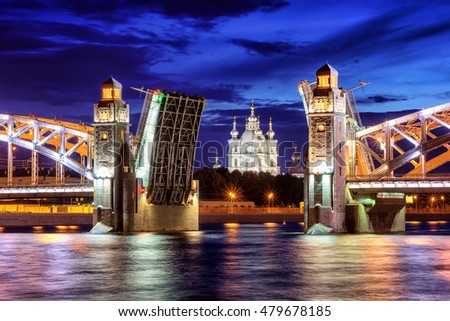 Peter the Great Bridge and Smolny Cathedral at summer white night time, St Petersburg, Russia