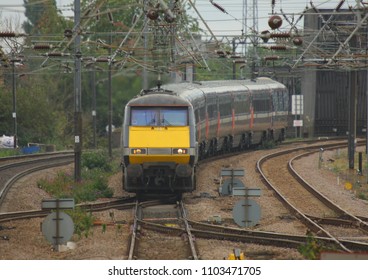 PETERBOROUGH, CAMBRIDGESHIRE, UK - SEPTEMBER 11, 2010: East Coast Main Line Class 91 No. 91120, Leads The London King's Cross To Glasgow Central Service Into Peterborough Station.