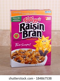 PETERSBURG, ILLINOIS-MARCH 26, 2014:  Box Of Kellogg's Raisin Bran On A Kitchen Counter.  Kellogg's Is An American Multinational Manufacturer Of Cereal And Convenience Foods.