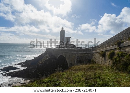 The Petit Minou  lighthouse, proud guardian at the entrance to the harbor of Brest in the Iroise Sea, embodies the maritime majesty of Brittany, watching over the tumultuous waters with timeless elega