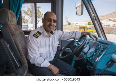 PETRA, JORDAN - MAY 07, 2015: Uniformed Tour Bus Driver