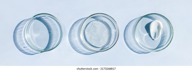 Petri Dish With A Sample Of A Cream Smear With A Transparent Gel Serum On A Light Background