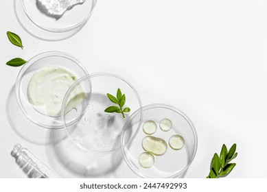 Petri dishes, cosmetic gel swatches and plants isolated on white background, copy space. Bio science research, biochemistry, organic vegan skin care concept.