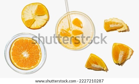Petri dishes with orange research. Cut orange, research in the laboratory. Bioengineering, laboratory.
