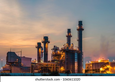 Petrochemical Industrial and power plant energy at night - Shutterstock ID 1060611020
