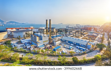 petrochemical industry on sunset , hong kong coal power station and oil tank