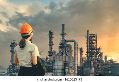 Petrochemical industry on sunset and Twilight sky, Energy power station area. Petrochemical industry with worker or engineer.