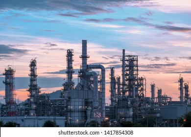 petrochemical plant industry,​ Refinery factory,​Oil and natural gas storage tank at cloud sunrise sky background
