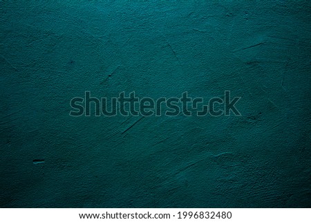 Petrol colored abstract texture background with textures of different shades of petrol also called teal