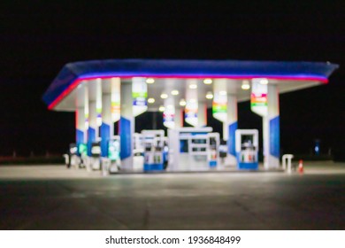 Petrol gas station at night time blurred background with bokeh light