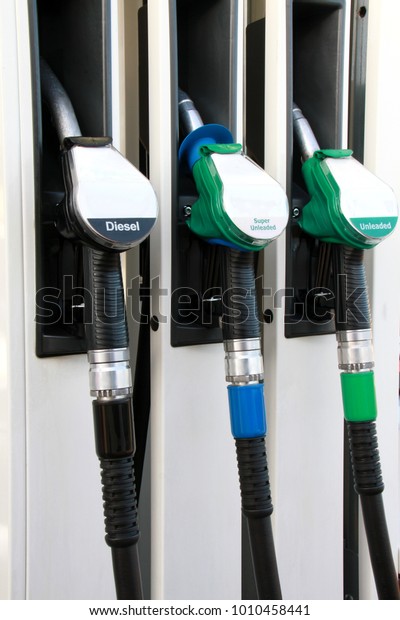 petrol pump with unleaded fuel at a\
petrol station no people stock image and stock\
photo