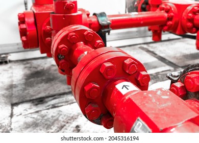 Petroleum oil and gas drilling equipment. Choke and kill manifolds are wellhead equipments that are assembled on the blowoul preventer units. Piping and valve system on offshore wellhead platform.