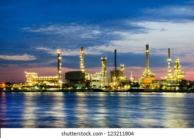 Petroleum oil refinery factory over sunrise in Bangkok, Thailand