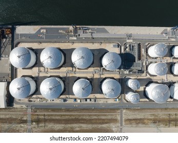 Petroleum Oil Storage Silos. Refinery Industrial Oil Tank Container Top Down Aerial Drone View. Chemical Liquid Metal Business Storage Container Structure. Overhead Top Down View.