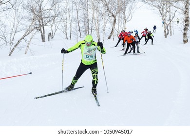 PETROPAVLOVSK CITY, KAMCHATKA PENINSULA, RUSSIAN FAR EAST - FEBRUARY 10, 2018: Skiers Running On Ski Track In Winter Forest. All-Russia Mass Ski Race - Ski Track Of Russia.