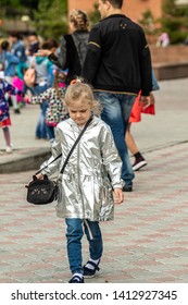 Petropavlovsk, Kazakhstan - June 1, 2019: International Children's Day. The parade of schoolchildren students through the streets of the city. Children and parents in national holiday clothes.  - Shutterstock ID 1412927345
