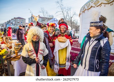 PETROPAVLOVSK, KAZAKHSTAN - MARCH 21, 2015: Celebration Of The New Year On The Solar Calendar Astronomical In Iranian And Turkic Peoples. People In National Clothes