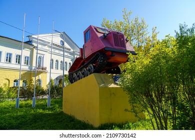 Petrozavodsk, Russia 05.30.2021. Tractor monument of real old one skidder at the building where was Tractor Plant