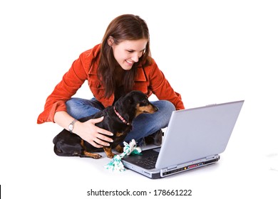 Pets: Woman And Dachshund Use Laptop
