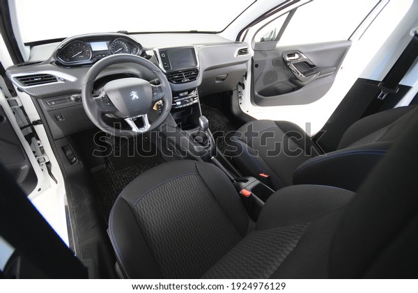 Peugeot 208 Car vehicle interior\
cockpit details inside dash board dashboard center console interior\
exterior in orebro Sweden on 04.06.2019 no\
people