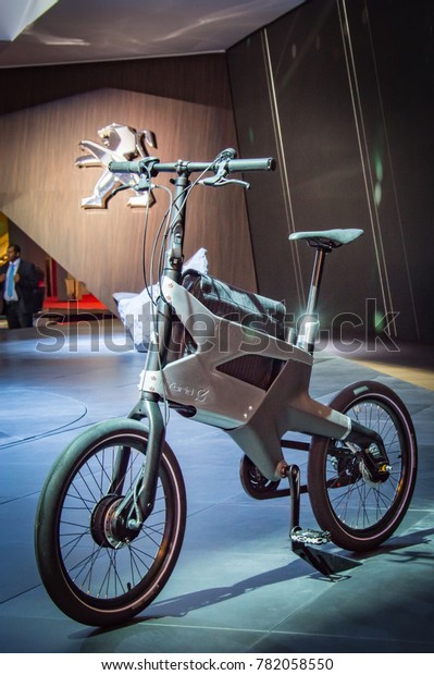Peugeot hybrid bicycle at Paris Auto Motor Show.\
Paris, France - October 5,\
2014