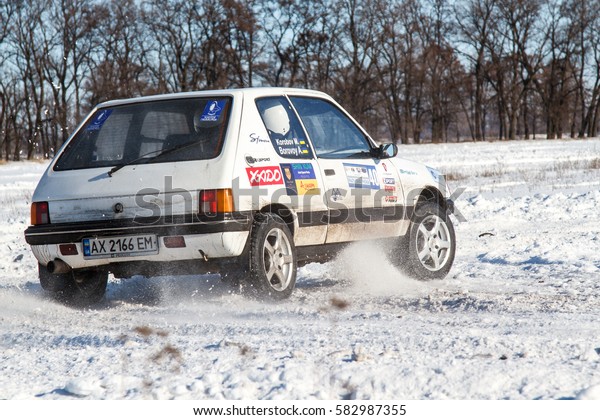 Peugeot Rally
driver takes part in rally Zaviriukha in the city Dnipro in Ukraine
in 21-22 of January 2017
year