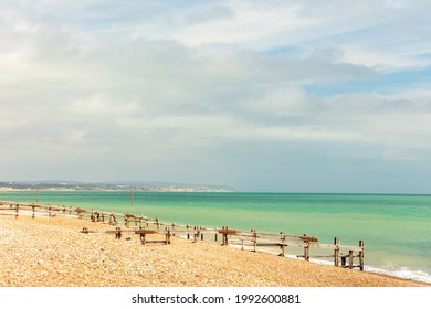 Pevensey Bay Beach Located Near Eastbourne, East Sussex, UK, Long Pebble Beach, No People, Space For Text, Sunny Day, Clear Waters, Affluent Area, 