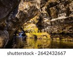 Pewits Nest in Wisconsin showcasing scenic glacier-carved gorge, cascading waterfall, and forest stream.