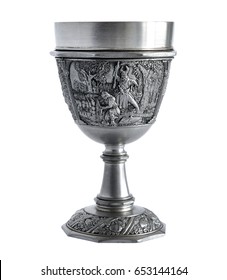 Pewter wine goblet with relief The Song of the Nibelungs isolated on a white background