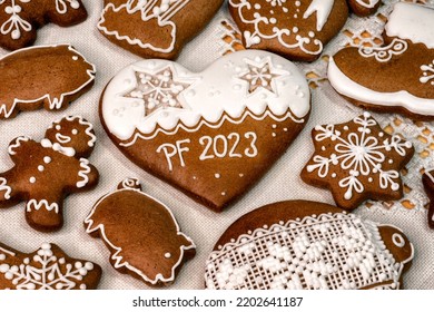 PF 2023 on Christmas gingerbread cookie with heart shape