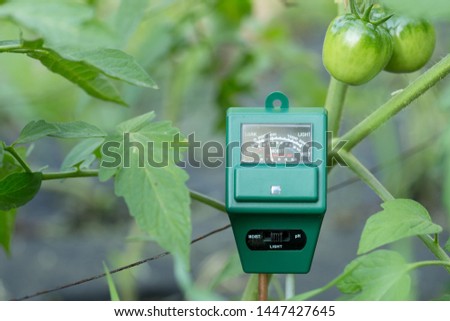 Ph meter, wet and luminosity sensor - modern gardening and farming concept