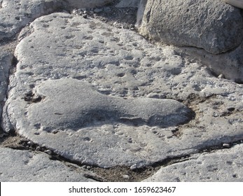 Phallic Shaped Carving On The Road In Pompeii, Italy Pointing The Way To The Brothel 