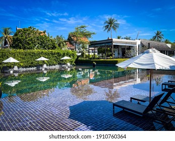 Phang Nga, Thailand - December 28,2020 : Beautiful Luxury Umbrella And Chair Around Outdoor Swimming Pool Resort