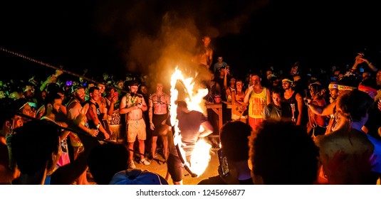 PHANGAN ISLAND, THAILAND-NOVEMBER 22, 2018:Tourist enjoy Full moon party all night at Haad Rin beach in Phangan island,Surat Thani,Thailand.This party will happen every month in the full moon day.