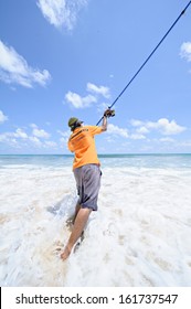 PHANGNGA PRIVINCE, THAILAND - May 20: An Unidentified Fisherman Is Casting His Line For Fishing In The Ocean May 20, 2012 In Phangnga Province, Thailand.