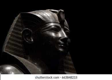 Pharaoh Egyptian gods dead religion symbol stone statue isolated on black