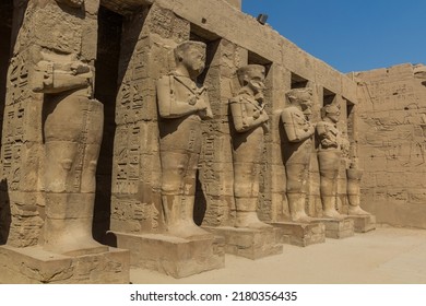 Pharaoh statues in the Amun Temple enclosure in Karnak, Egypt - Shutterstock ID 2180356435