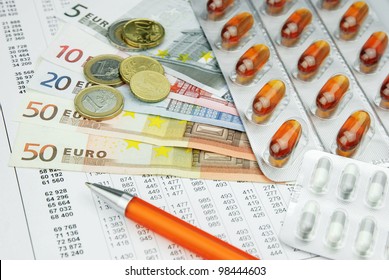 Pharma Medicine Pills And Drugs With Money And Pen