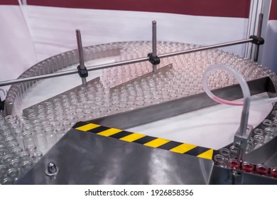 Pharmaceutical Automatic Production Line - Conveyor Belt With Empty Glass Bottles At Pharmacy Processing Factory. Manufacturing, Pharma Industry, Medicine And Automated Technology Equipment Concept