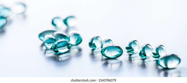 Pharmaceutical, branding and science concept - Blue pills for healthy diet nutrition, supplements pill and probiotics capsules, healthcare and medicine as pharmacy and scientific research background
