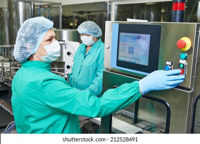 Pharmaceutical Factory Woman Worker Operating Production Line At Pharmacy Industry Manufacture Factory