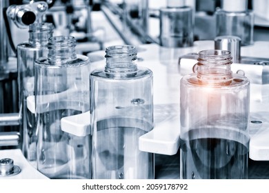 pharmaceutical industry, medicine pills are filling in the  bottle on production line machine conveyor at the medical factory. selective focus. - Shutterstock ID 2059178792