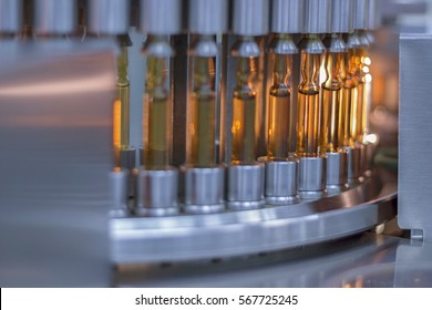 Pharmaceutical Optical Ampule / Vial Inspection Machine. Inspects Vials and Ampules for Particulates in Liquid and Container Defects. Pharmaceutical Manufacturing. Vaccine Manufacturing.