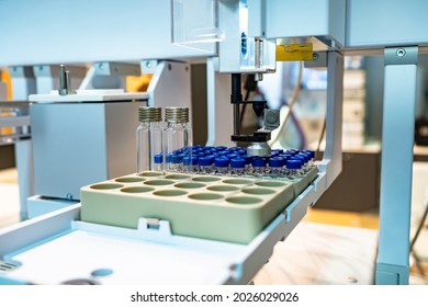 Pharmaceutical production. Production line with test tubes. Concept - production of pharmaceuticals. Manufacturing of medicines. Equipment for modern medical laboratory. Pharm manufacturing