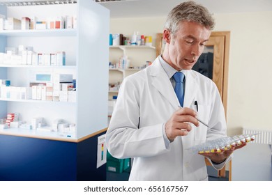 Pharmacist Counting Pills