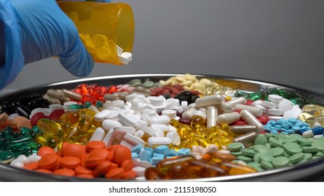 Pharmacist Drop Pills From The Plastic Bottle. Prescription Medication Administration. Health Care, Pharmacy And Treatment Concept, Close Up Top View Of The Hands. 