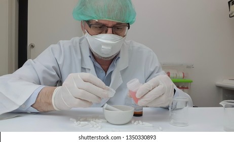 Pharmacist examining prescriptions in the pharmacy laboratory