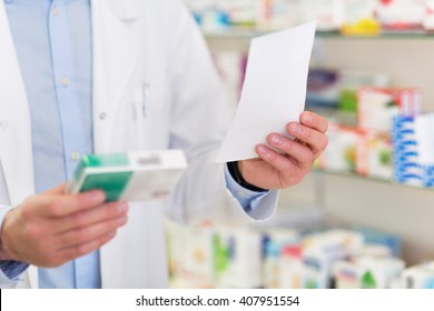 Pharmacist Filling Prescription In Pharmacy